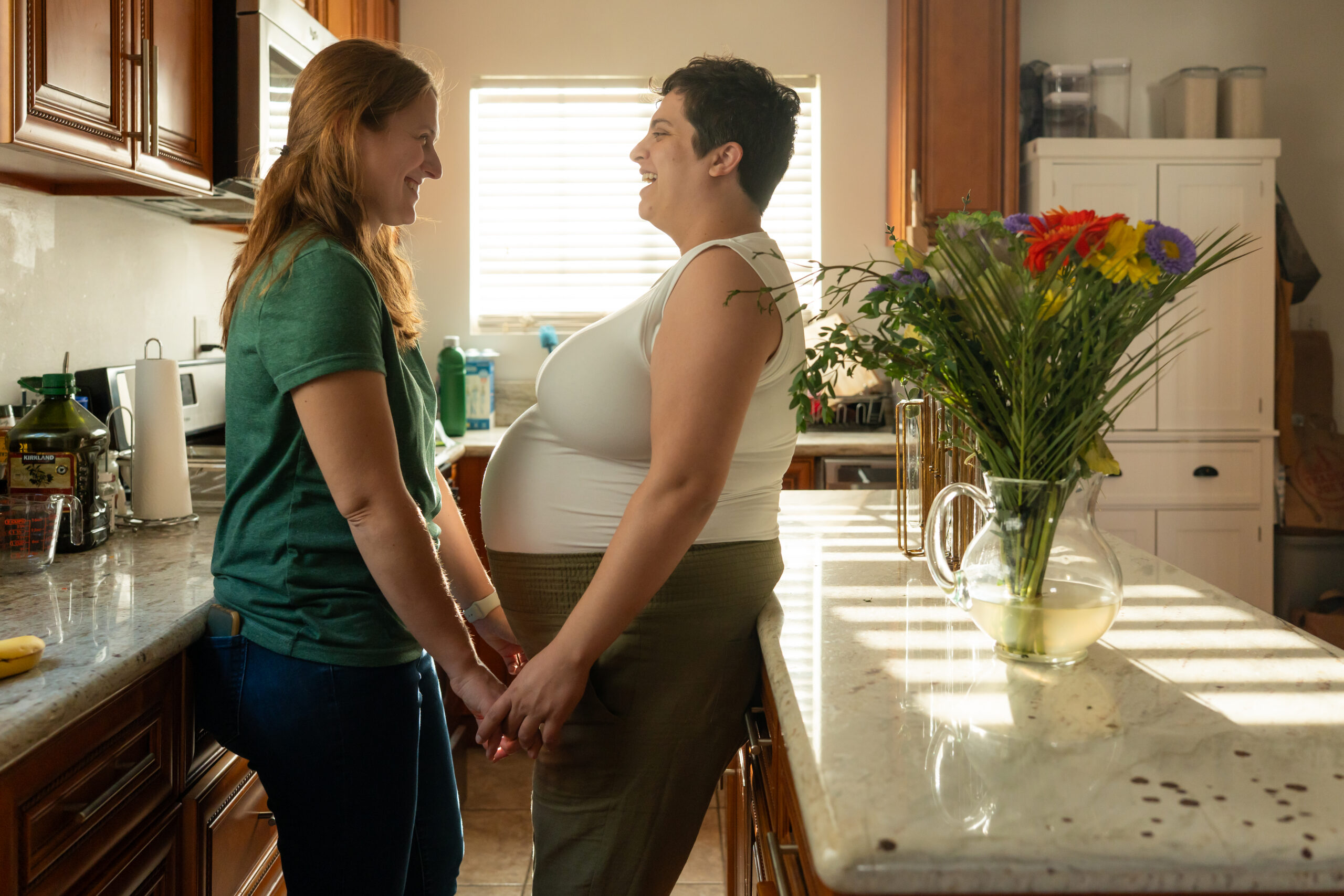 maternity session at home with two moms